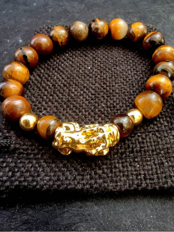 Feng Shui Bracelet for attracting money and wealth with ancient Chinese symbol Pi Xiu and tigers eye