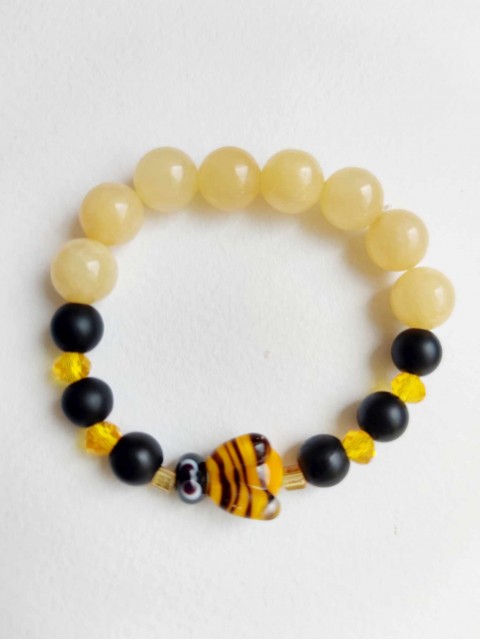 Bracelet with citrine, onyx, and a glass bee for attracting luck and happiness