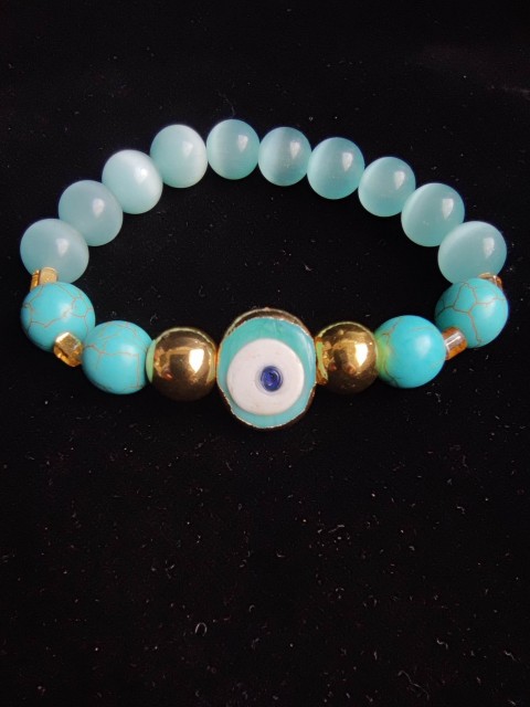 Magical bracelet amulet for protection against negative energy with turquoise and Nazar Evil eye bead