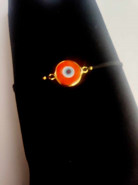Armband med orangefärgad Nazar för att fylla på din energi och skydda mot dålig energi