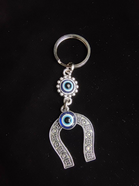 Keychain amulet for protection against bad luck and attracting fortune with Nazar - Horseshoe
