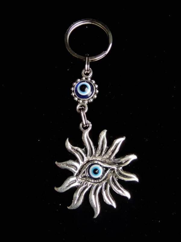 Keychain amulet for attracting good luck and protection from negative energy with Nazar - Sun