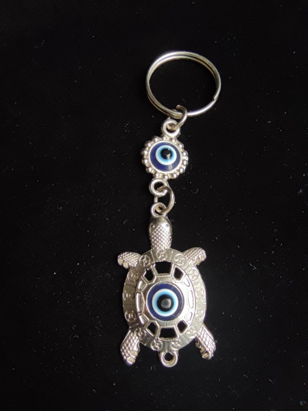Keychain amulet for protection against harmful energy with Nazar - Turtle