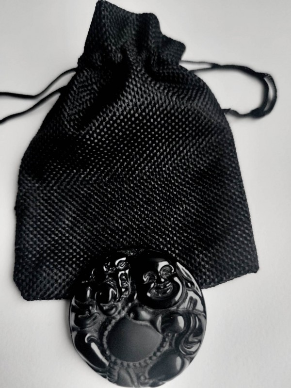 Black obsidian necklace with the laughing Buddha to attract prosperity