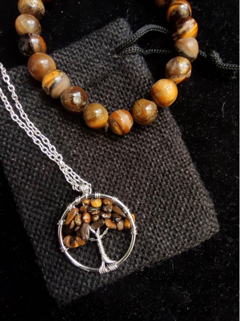 Talisman to attract wealth - tigers eye tree of life medallion