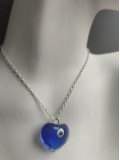 Magical amulet pendant for protection and Luck in love with a blue handmade glass Nazar