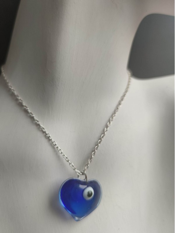 Magical amulet pendant for protection and Luck in love with a blue handmade glass Nazar