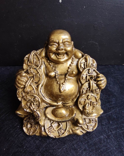 Przyciąganie bogactwa i pieniędzy za pomocą Lauging Buddha i Ganesha